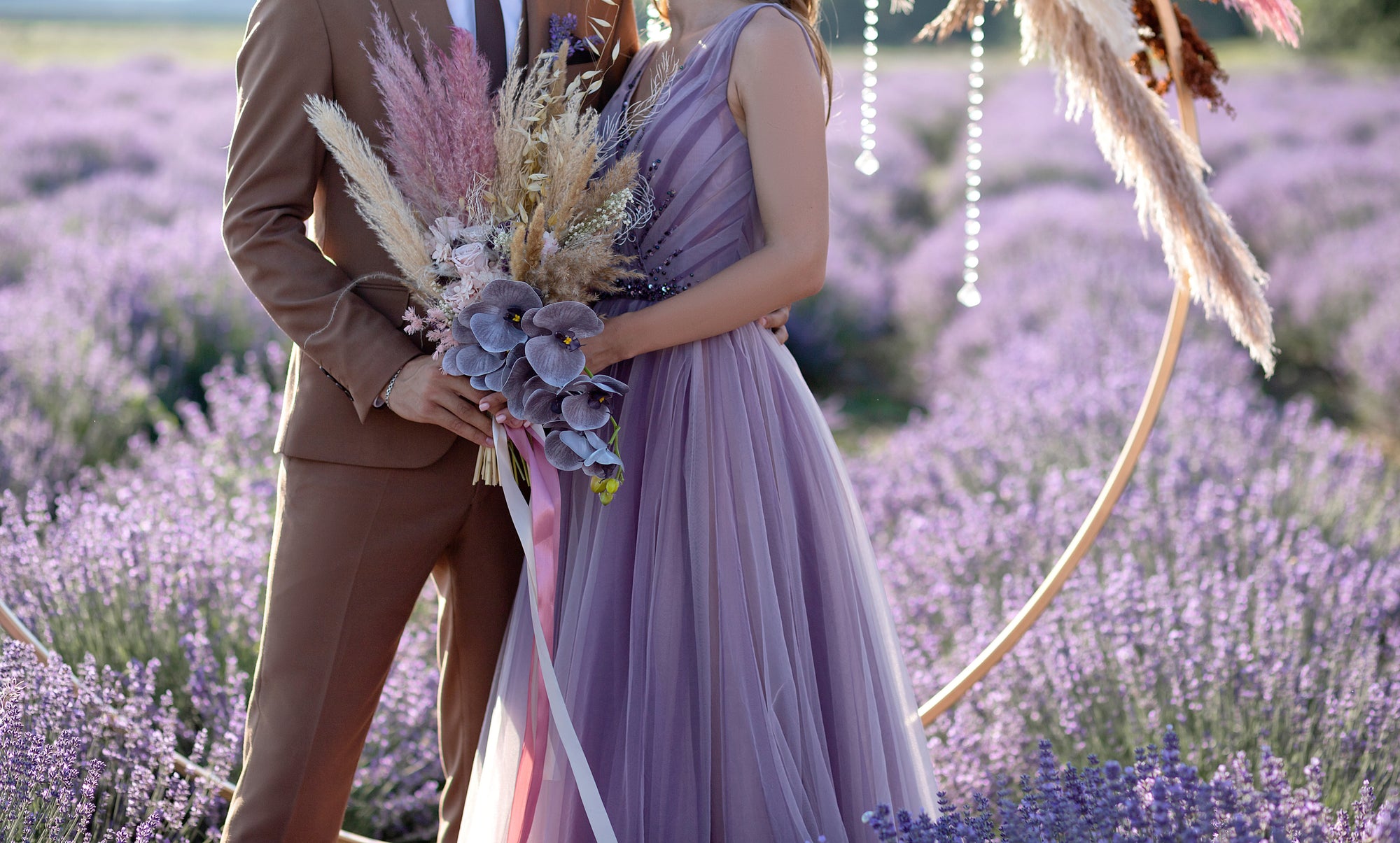newlywed couple adding purple color to their wedding look